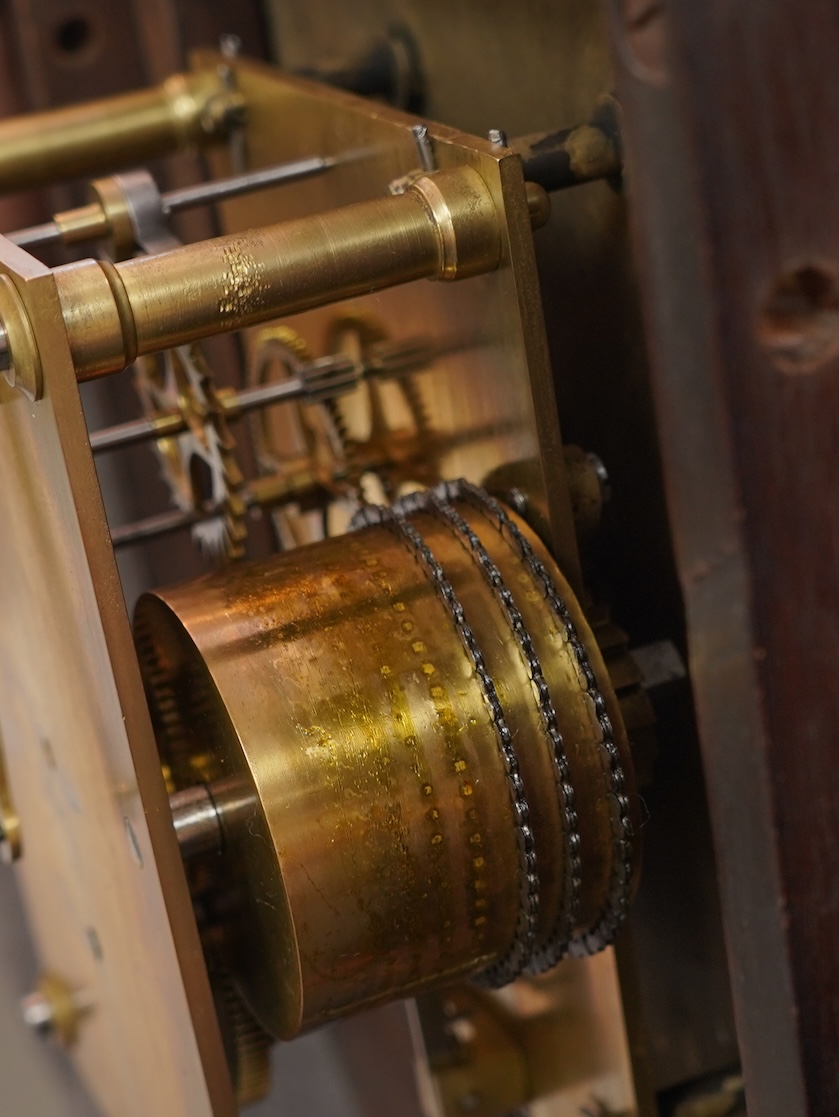 A GWR drop dial railway wall timepiece with fusee movement in a mahogany case, painted 12” dial with ‘shirt button’ GWR monogram and an ivorine plaque pinned to the lower left side of the case engraved with ‘GWR 3746’